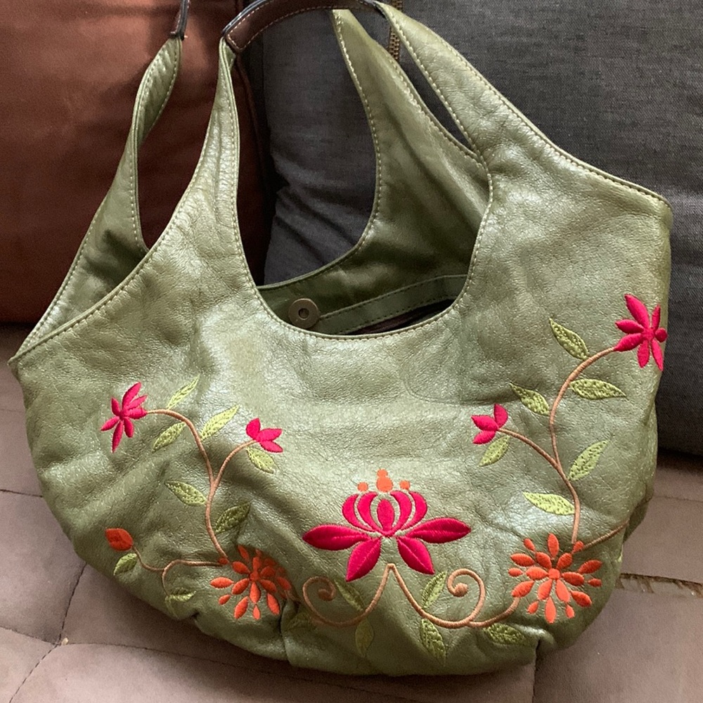Nice wrist bag it’s leather and really soft